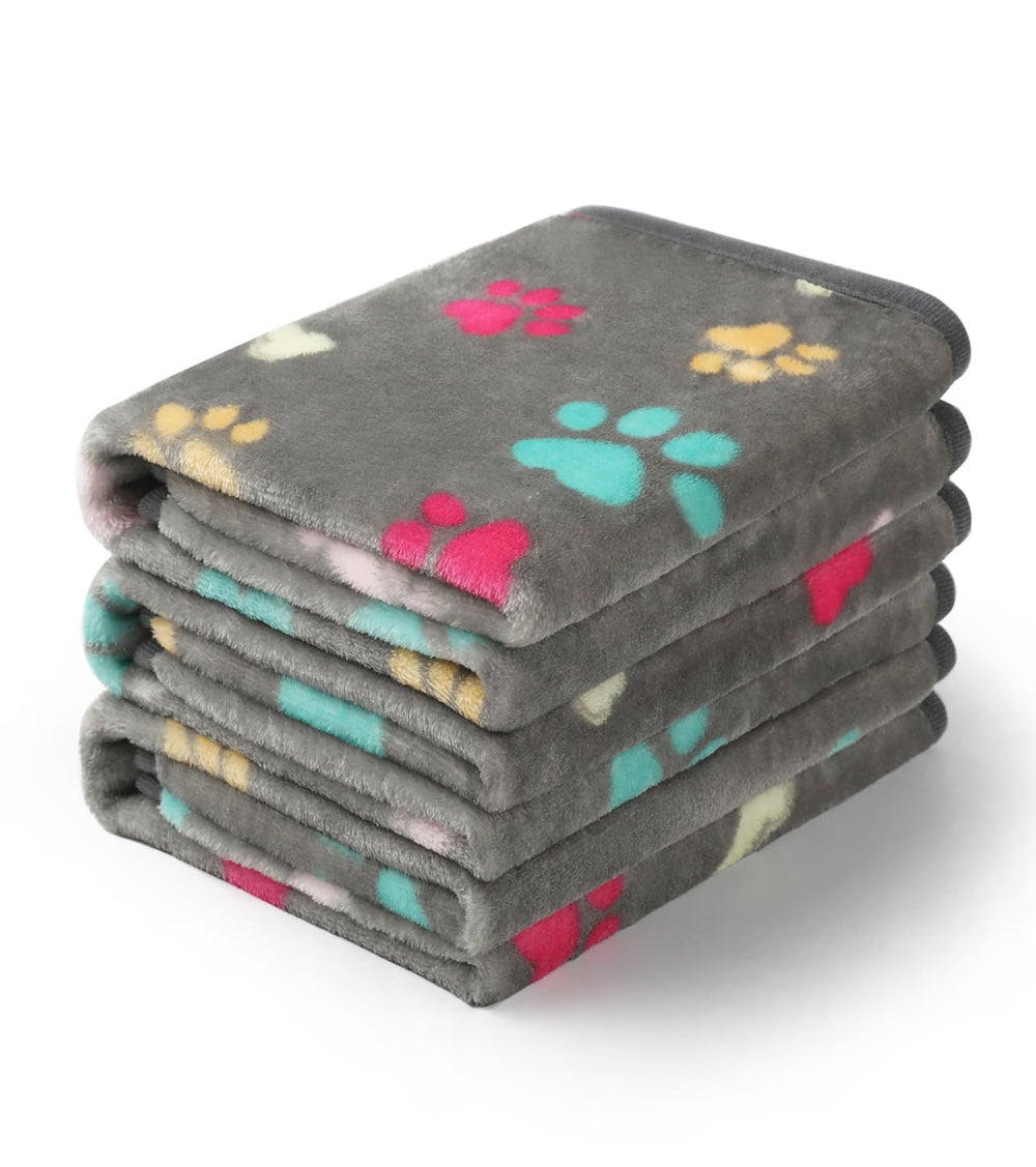 Luciphia fleece pet blanket with paw bone print for cozy furniture protection.