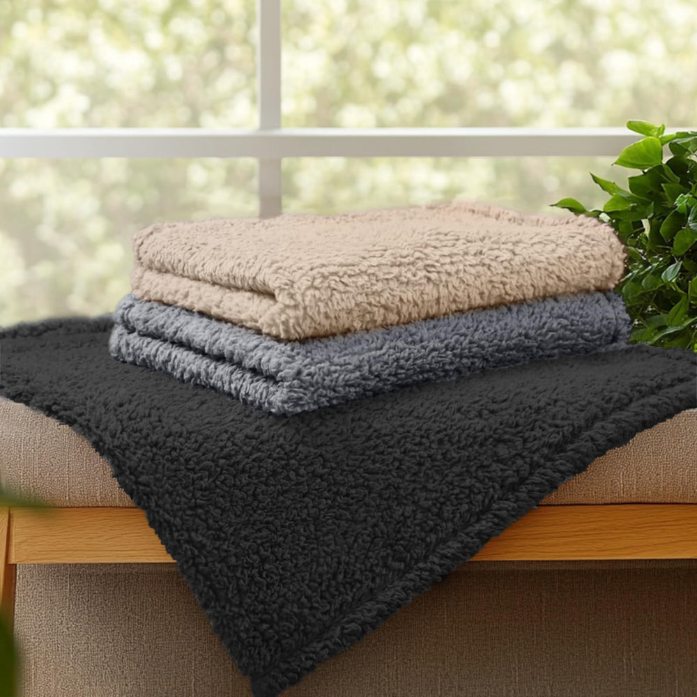 Luciphia calming blankets available in beige, black, and grey