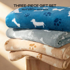 Luciphia dog blanket on sofa protecting furniture from hair and scratches.