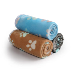 Luciphia paw-print blanket in brown protects furniture from pet fur and scratches