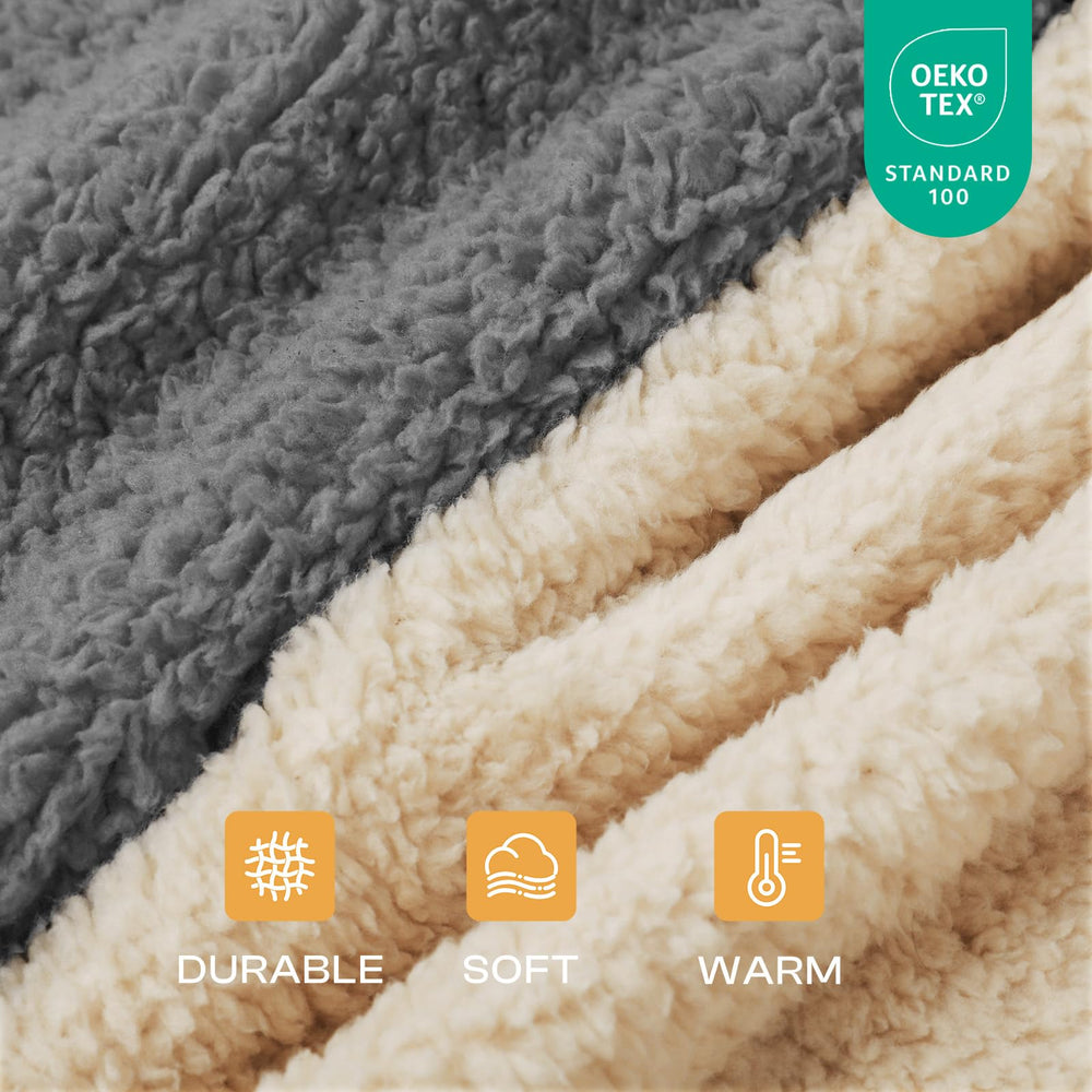 Luciphia beige blanket folded to show plush sherpa texture and warmth.