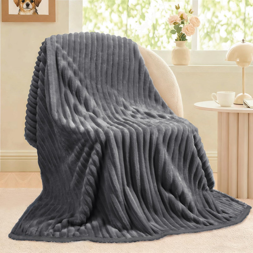 Luciphia Waterproof Dog Blanket two-sided comfort on a couch, luxurious warmth.