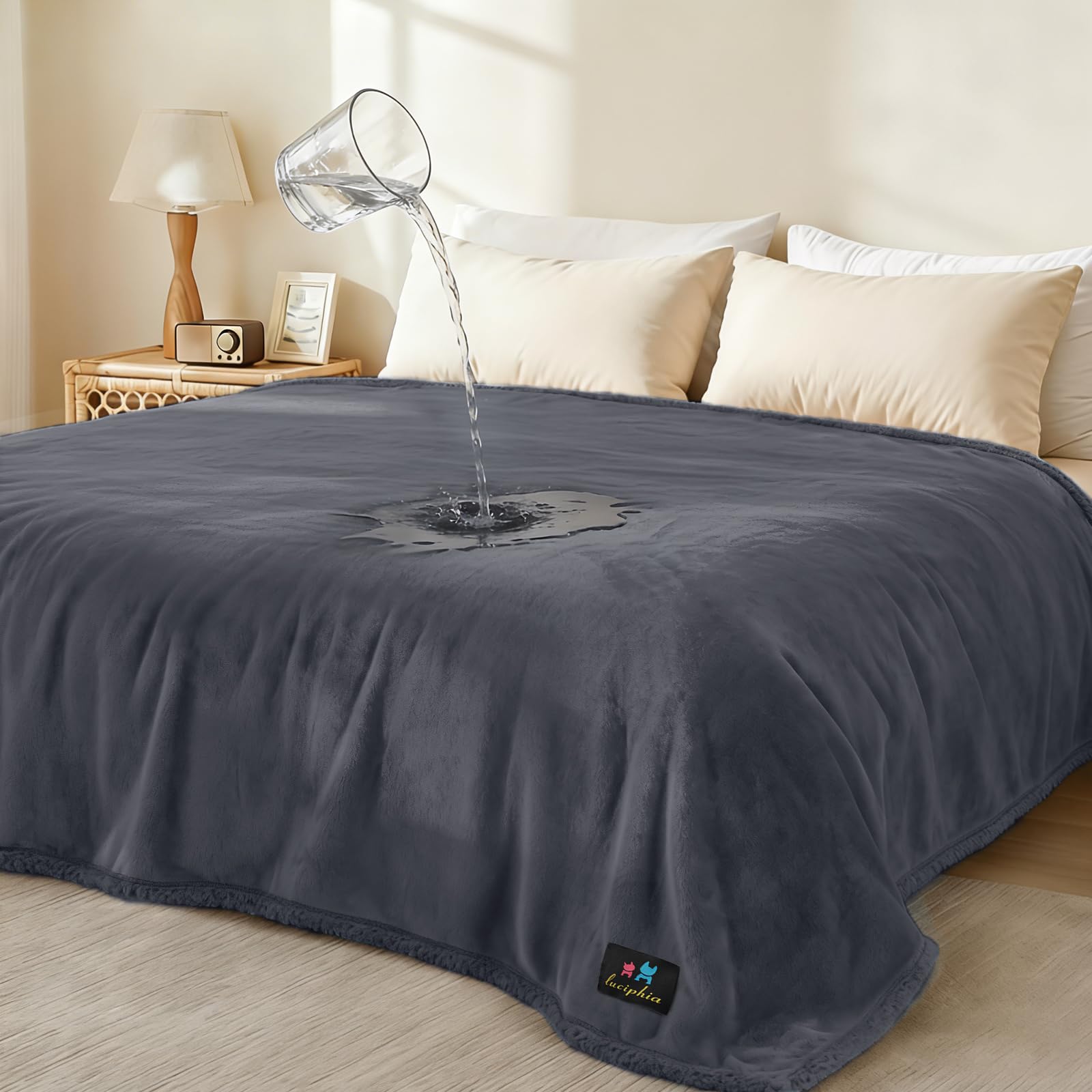 Luciphia waterproof pet blanket on sofa showing triple-layer protection against spills