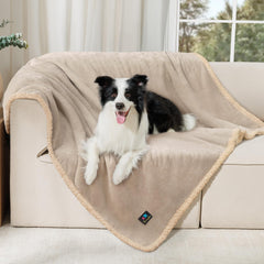 Luciphia waterproof pet blanket on sofa protects against spills and accidents.