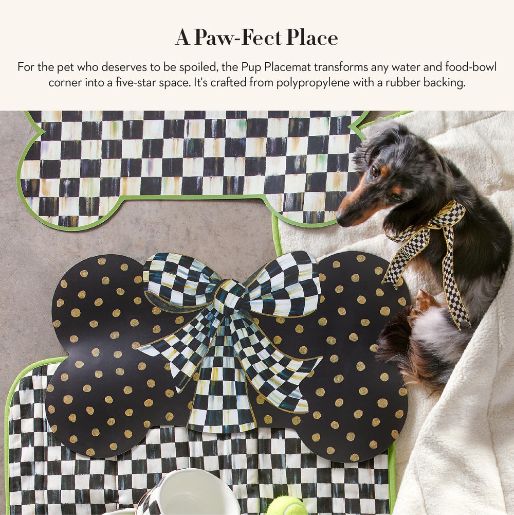 Mackenzie-Childs Courtly Bow pet mat with gold dots enhances dining areas