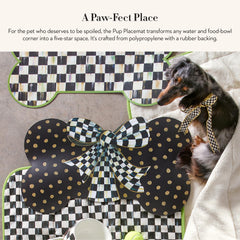 Mackenzie-Childs Courtly Bow pet mat with gold dots enhances dining areas