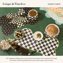 Mackenzie-Childs hand-painted Courtly Check finish enhances home decor