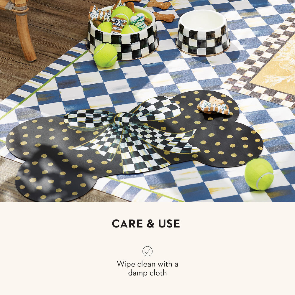 Mackenzie-Childs Indoor-outdoor pet mat blends with any home décor