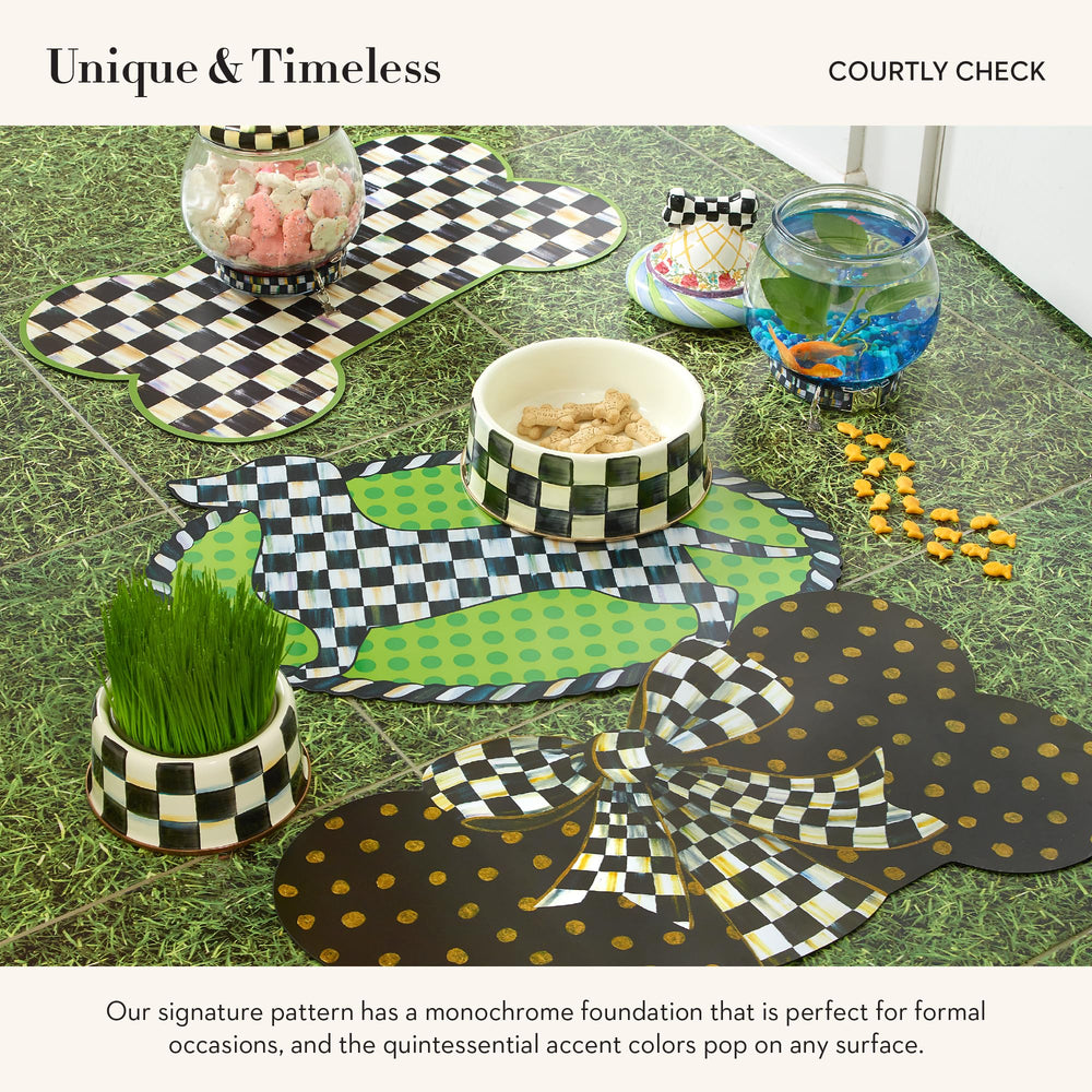 MACKENZIE-CHILDS Pup Placemat compatible with dog bowls to create a tidy station.