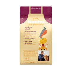 Made by Nacho salmon-pumpkin kibble close-up; crunchy texture designed to entice picky eaters.