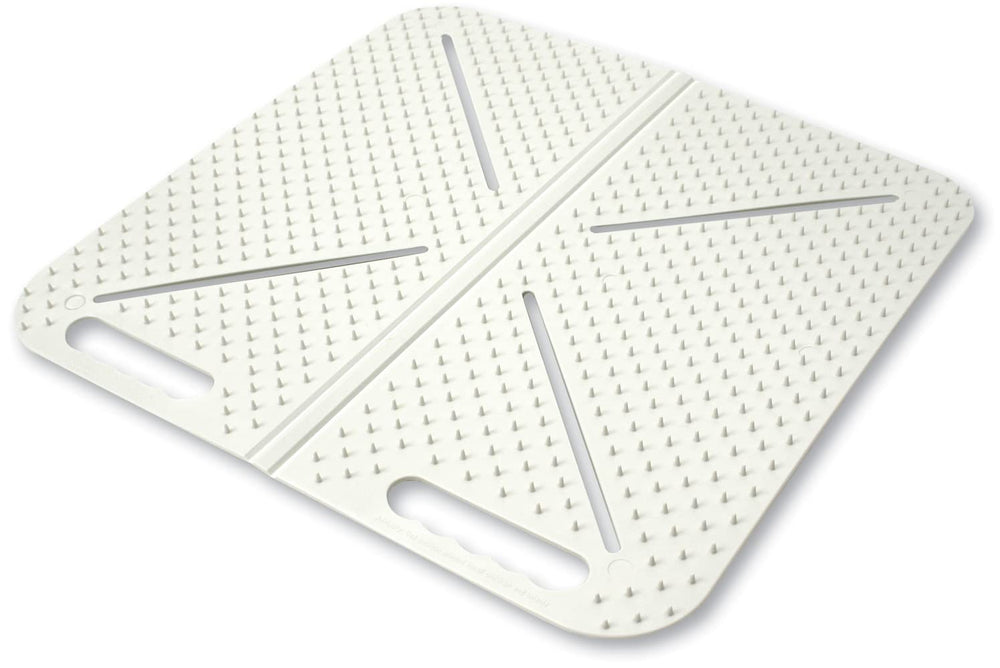 Mammoth X-Mat Foldable Training Mat in beige keeps pets off furniture.