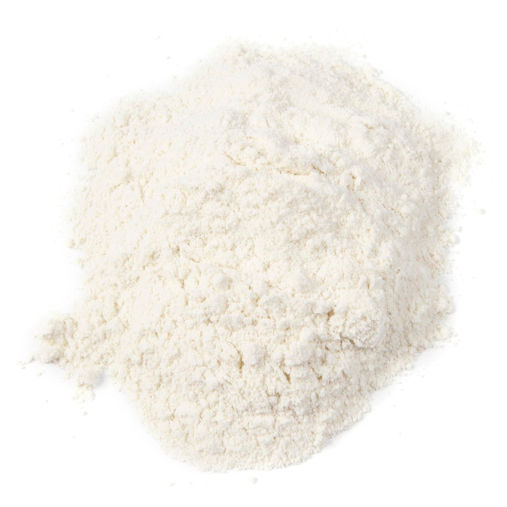 UniMilk powder close-up highlighting all-milk protein formula for growth