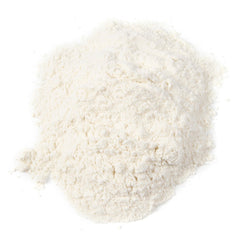 UniMilk powder close-up highlighting all-milk protein formula for growth