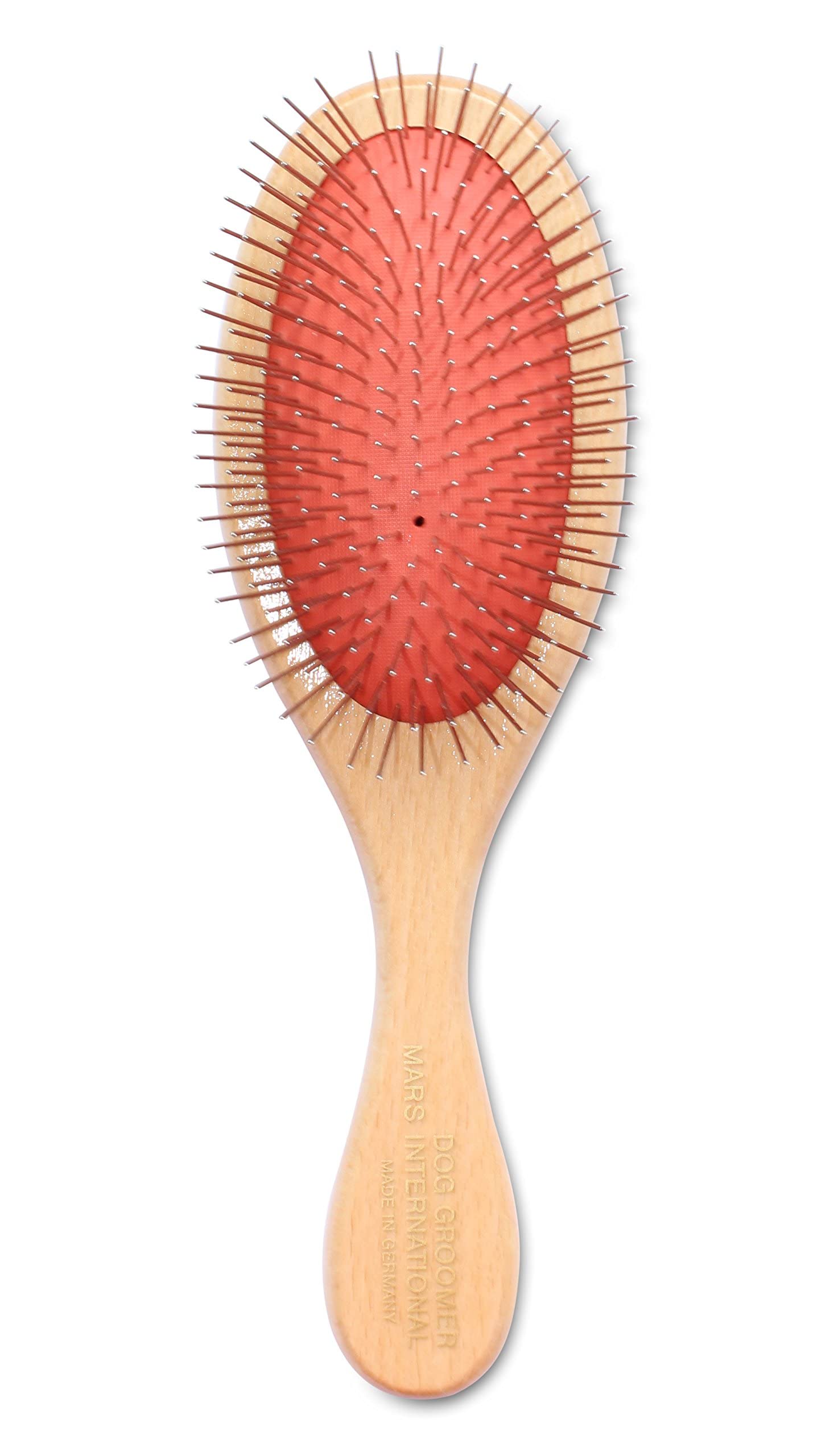 Mars Coat King brush showing soft rubber pad and rotating pins for flexible grooming on dogs and cats