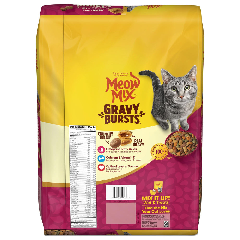 Cat enjoying Meow Mix Gravy Bursts, protein supports muscles