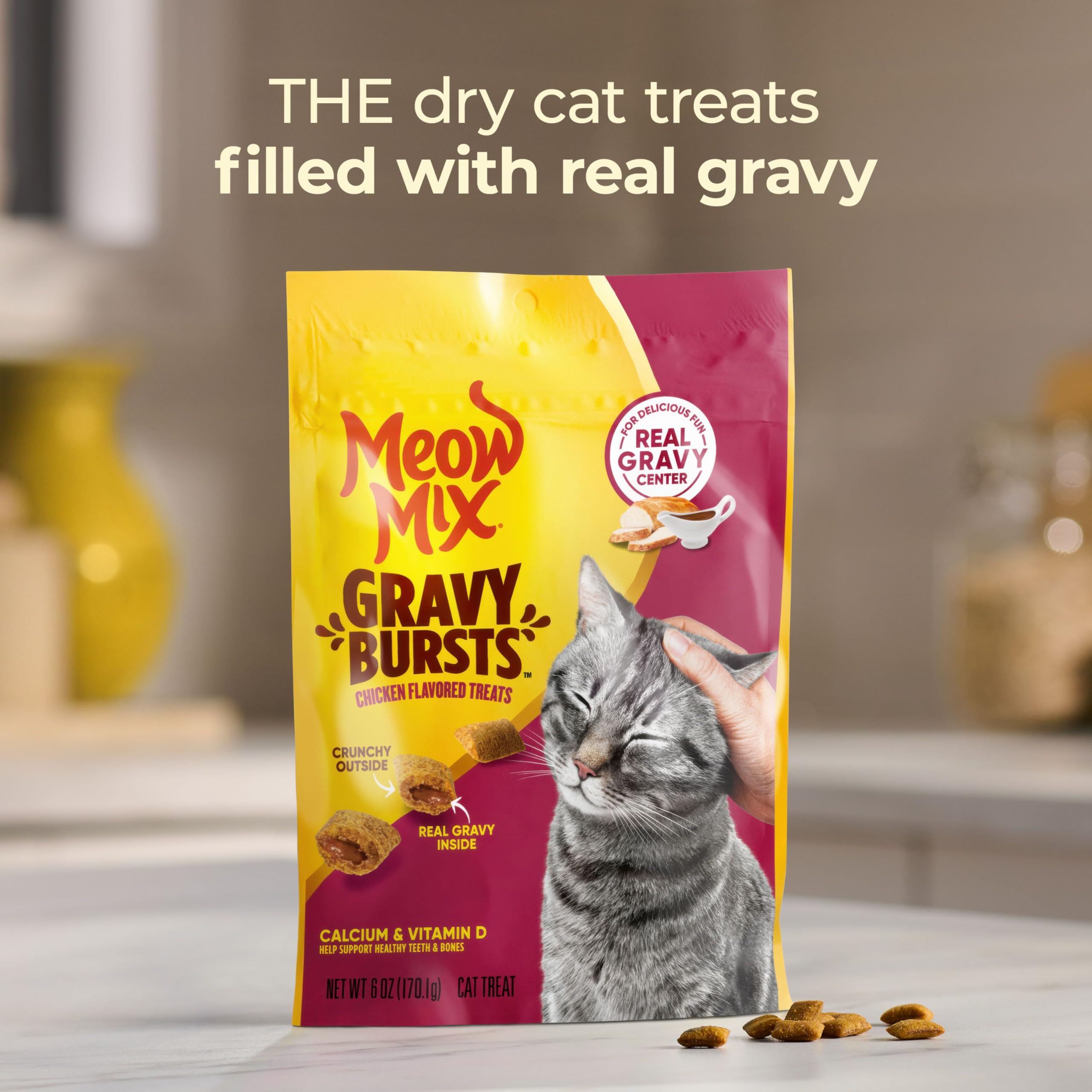 Meow Mix Gravy Bursts packaging with five bags ready for snacktime.