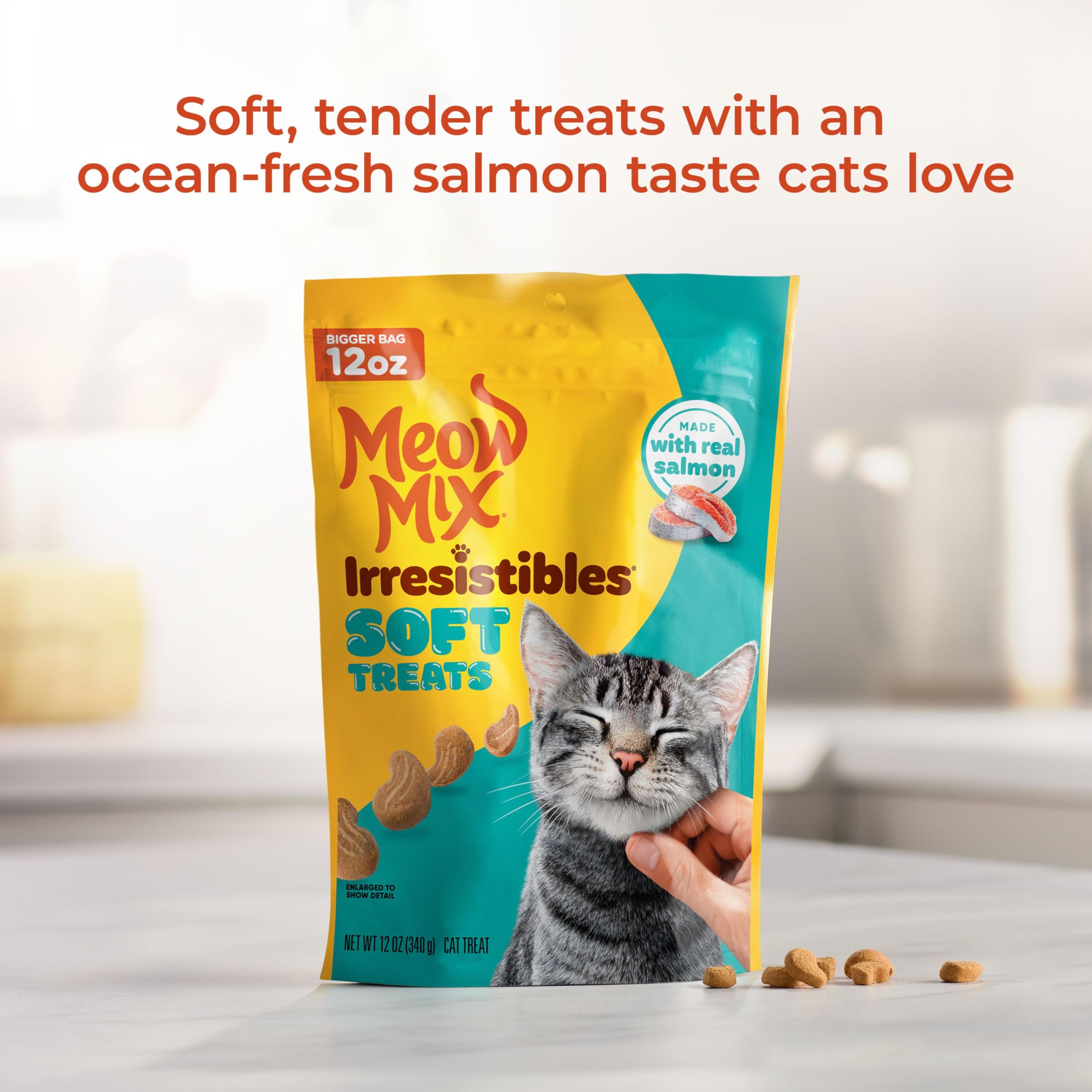 Meow Mix Irresistibles real salmon treats shown with easy-close packaging for training rewards.
