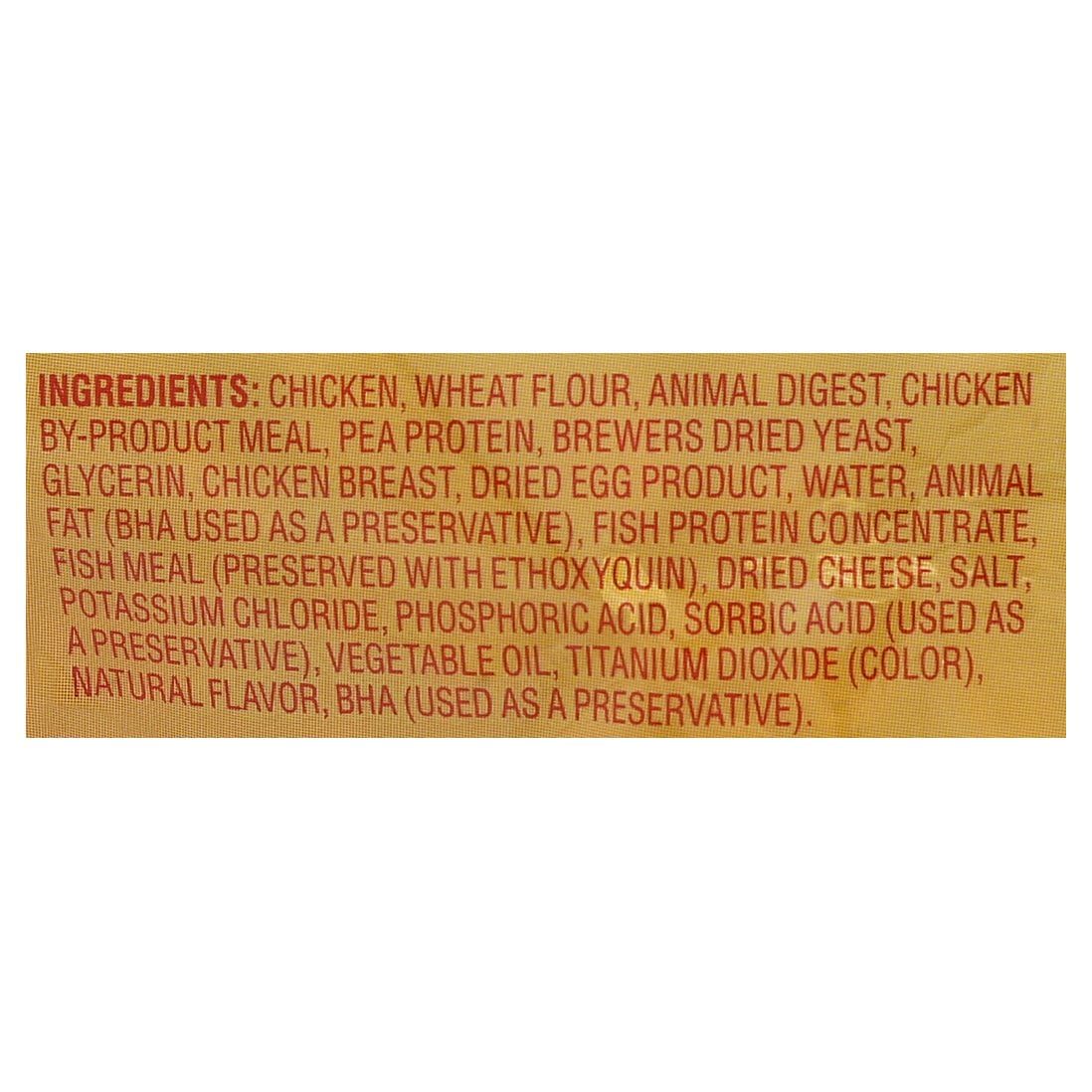 Meow Mix Irresistibles soft chicken treat close-up highlights tender texture.