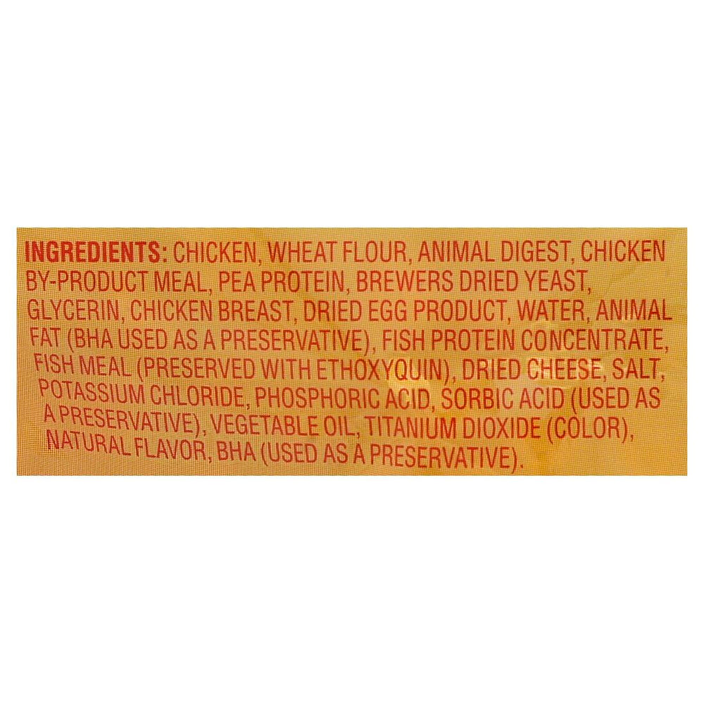 Meow Mix Irresistibles soft chicken treat close-up highlights tender texture.