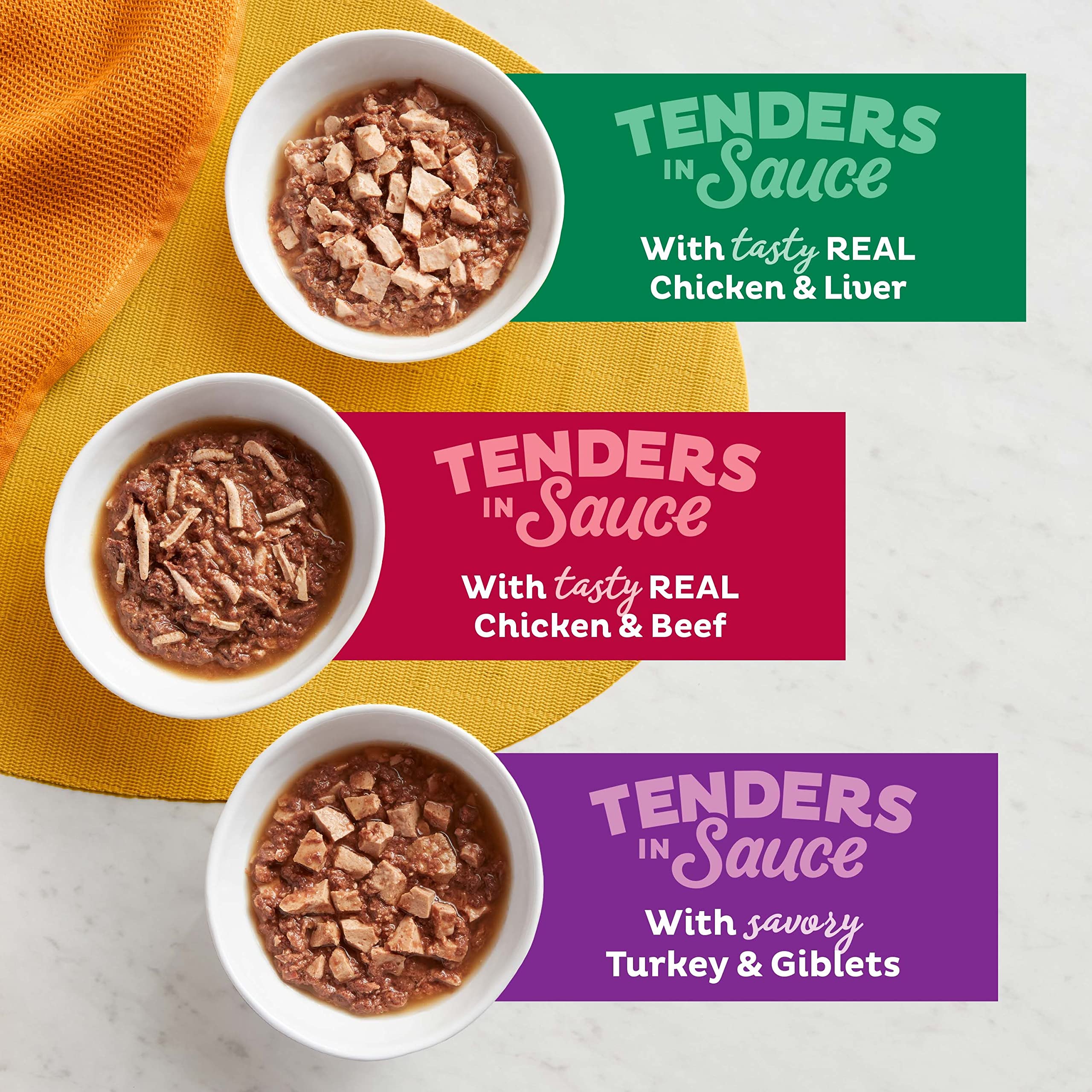 Meow Mix Tenders Turkey and Giblets in Sauce cups with varied texture.