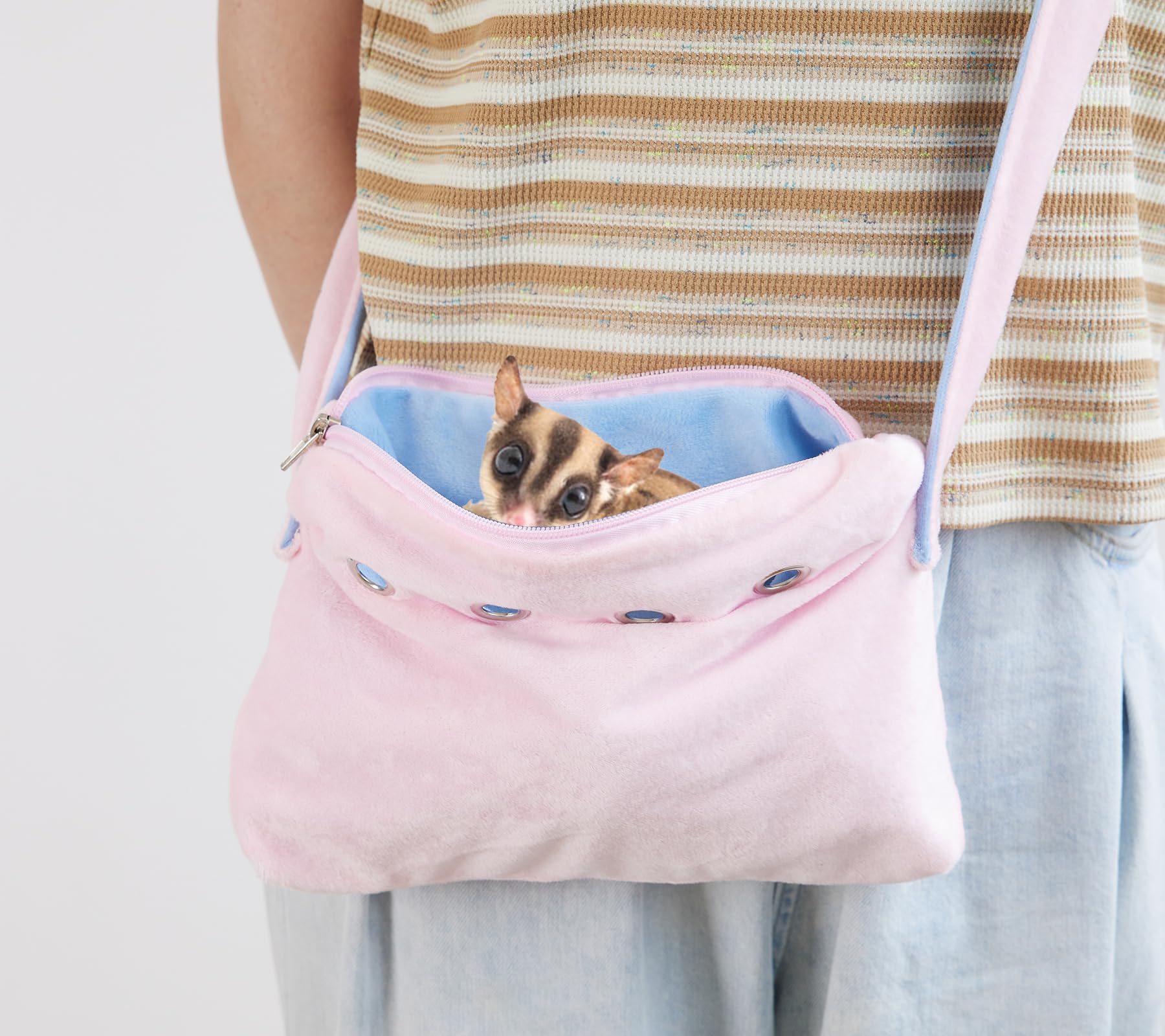 Meow&Woof travel sling being worn for chest carry