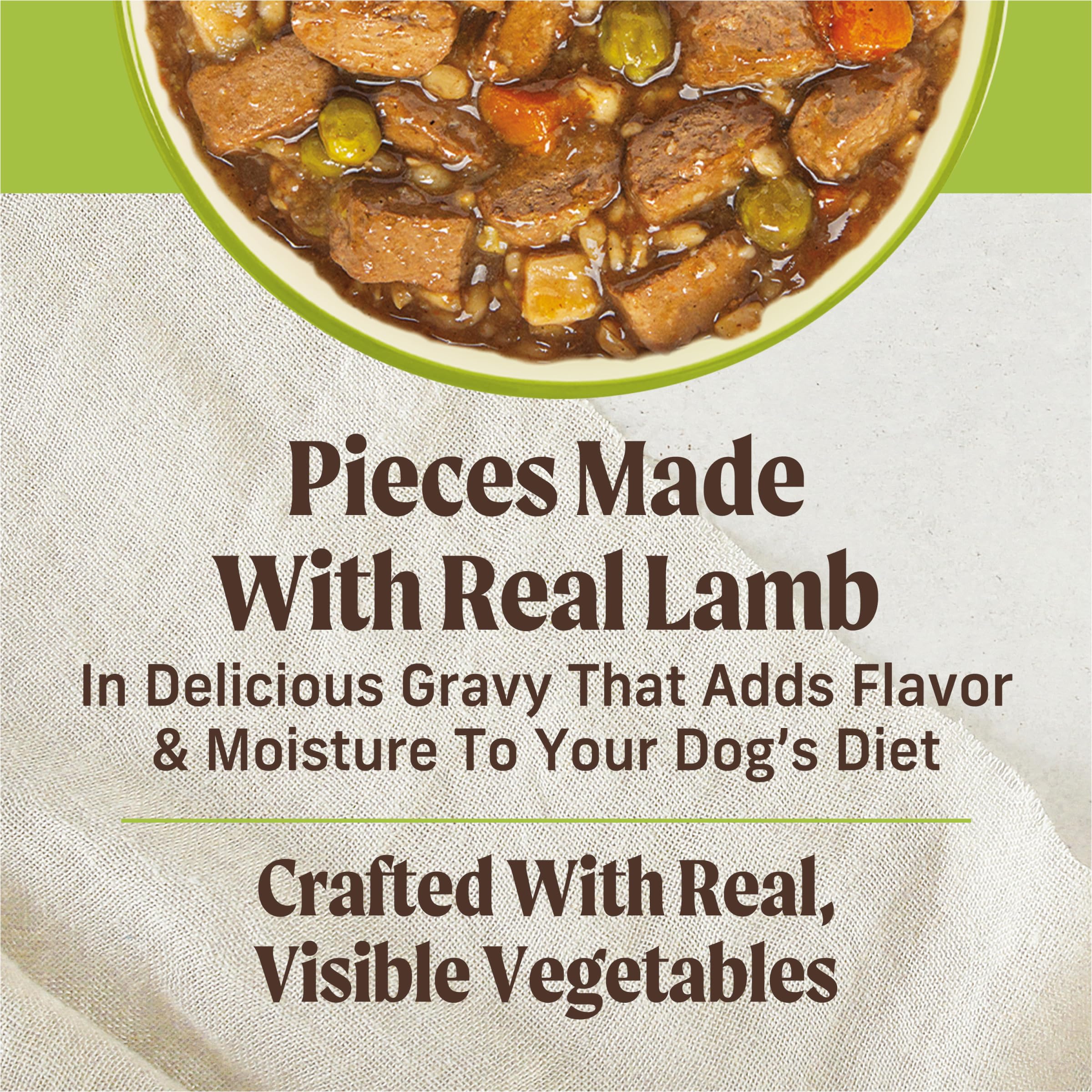 Merrick Kitchen Comforts lamb chunks closeup emphasizes real meat texture and quality.