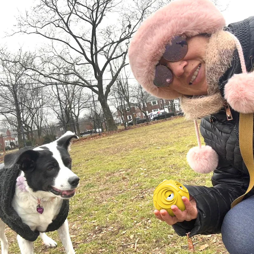Natural rubber Giggle Ball in owl design provides dynamic squeak action.