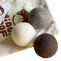 Miao and Woof wool felt ball close-up texture demonstrates gentle teeth and gum-friendly play.