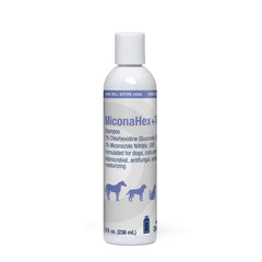 MiconaHex+Triz shampoo bottle closeup showing multi-species formula for healthy skin.
