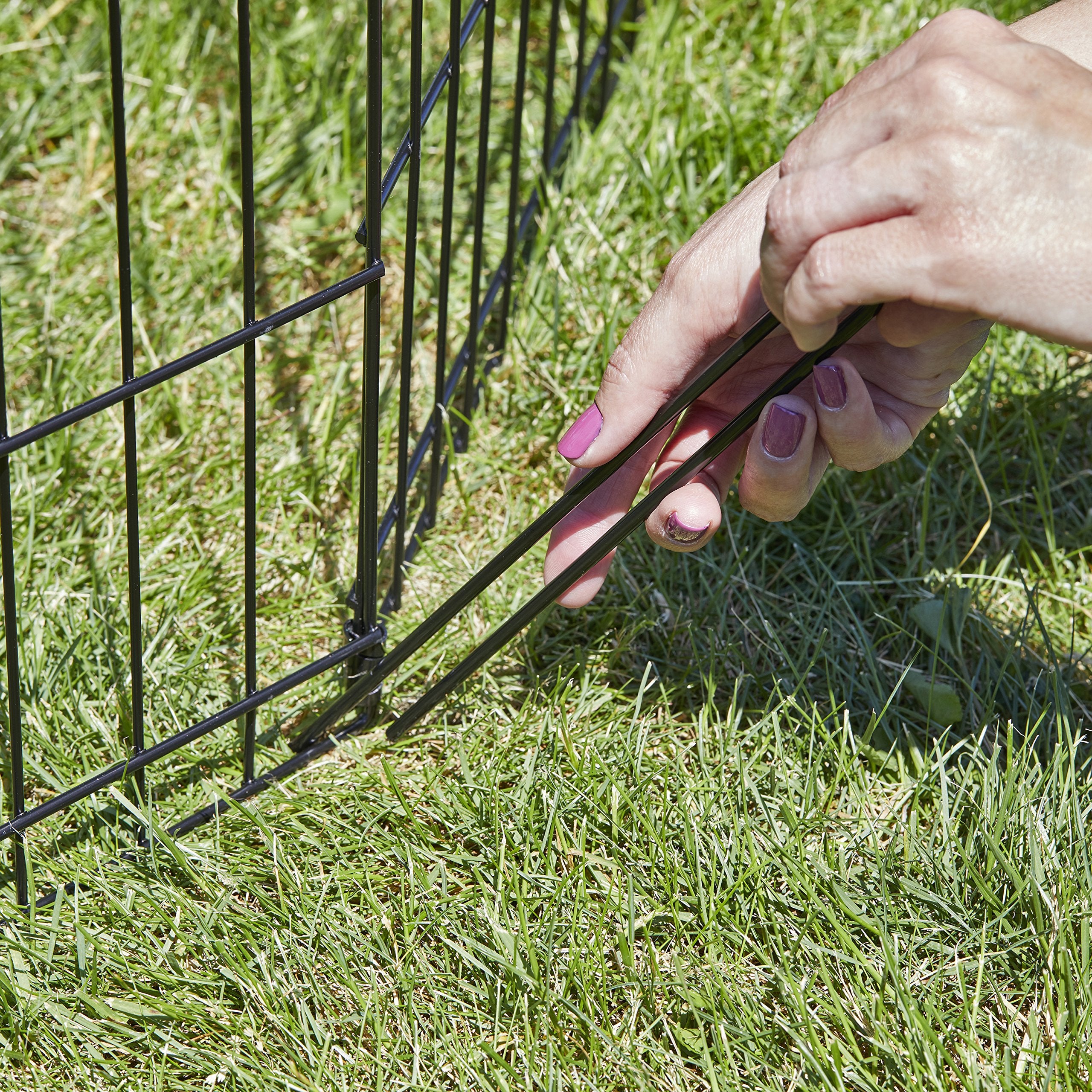 MidWest Homes for Pets pen with ground anchors provides stable outdoor exercise