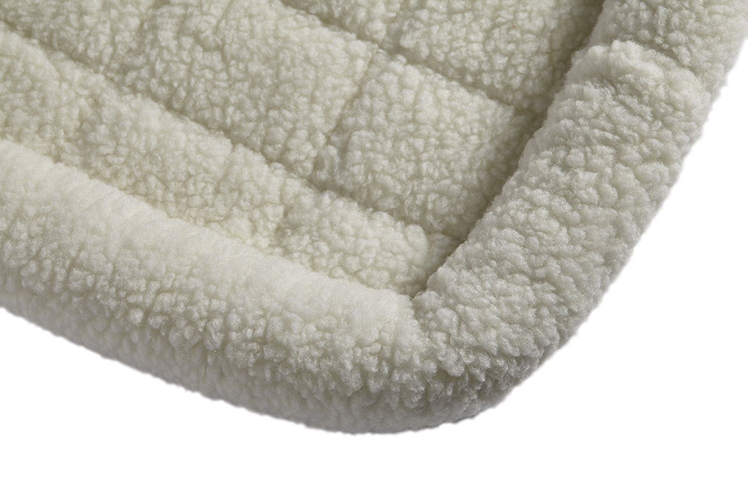 Side view highlighting the padded bolster around QuietTime bed