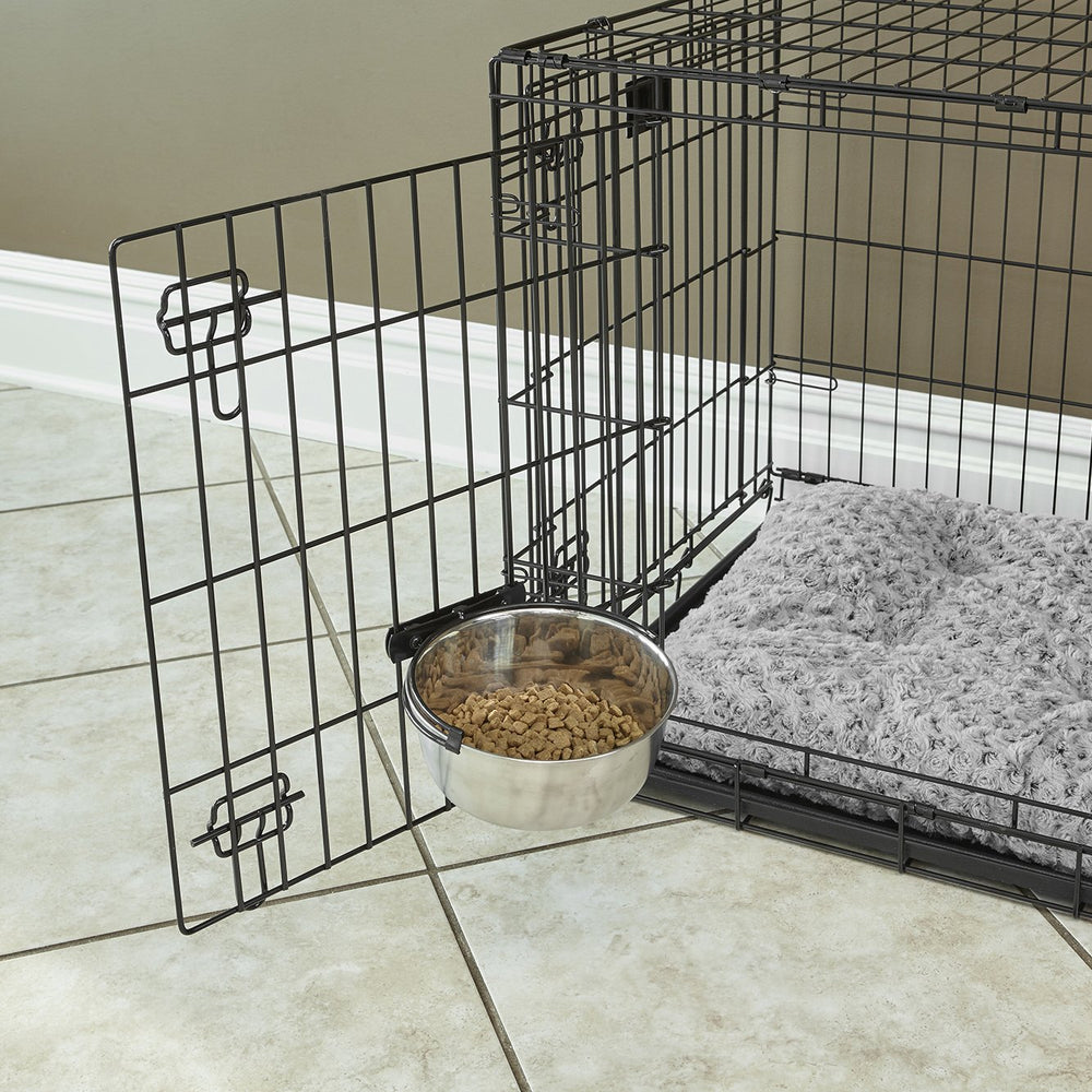 Bracket attached to crate bars secures the bowl for stable feeding.