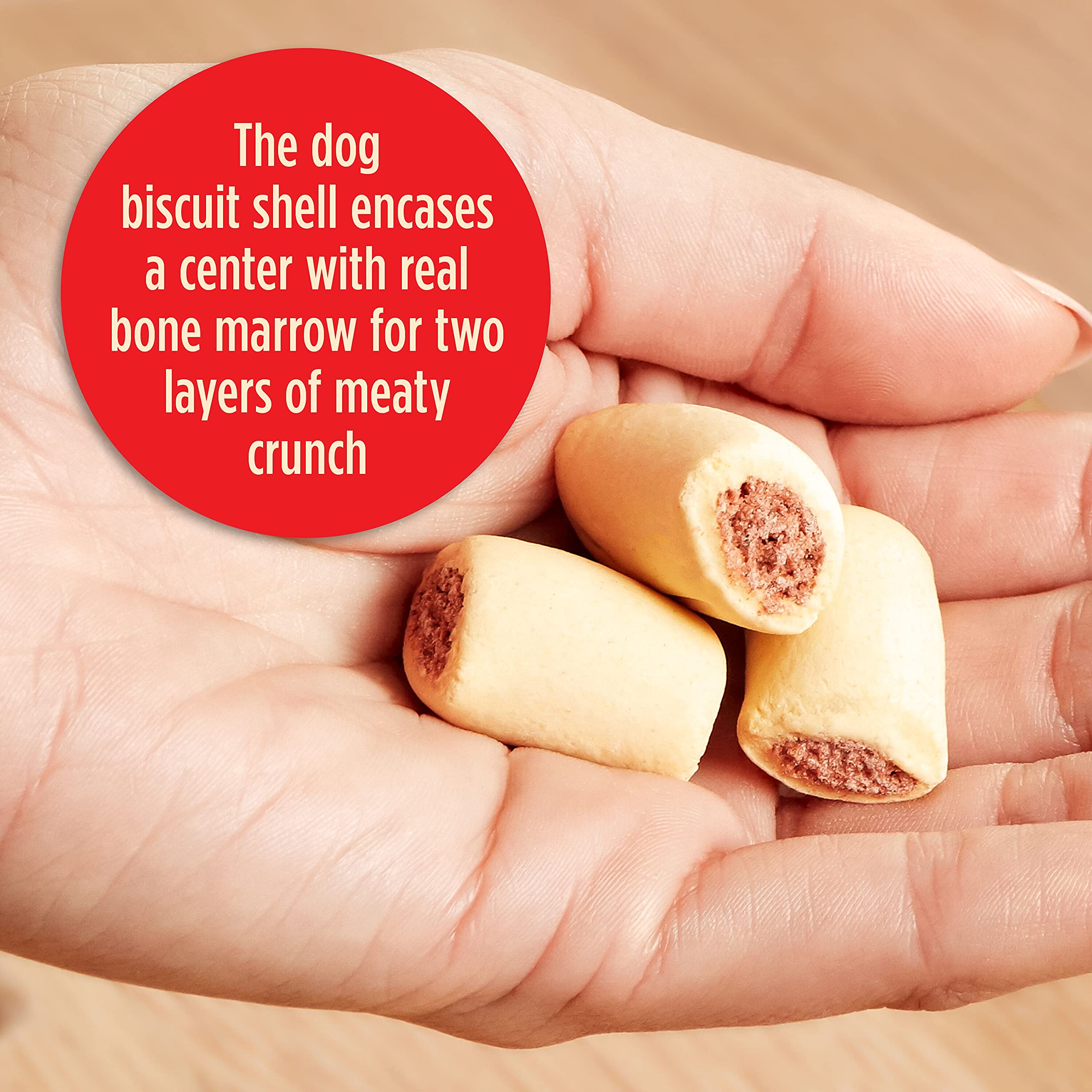 Milk-Bone MaroSnacks small dog treats bite showing size and texture.