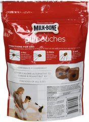 Milk-Bone Pill Pouches dog enjoying chicken flavor during medicine time.