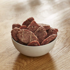 Milo's Kitchen beef sausage slices with rice packaging front, 12 slices per bag