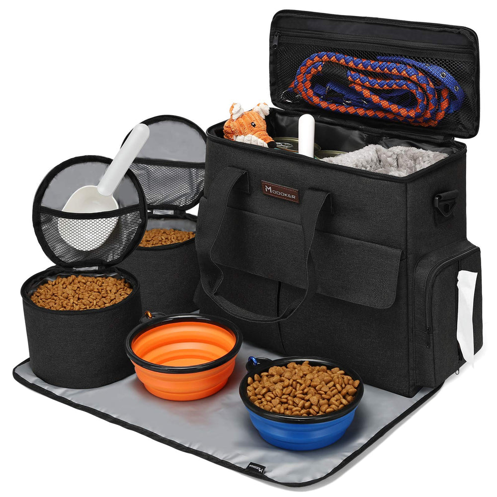 Modoker dog travel bag included items show tote, two bowls, food carriers, and placemat.