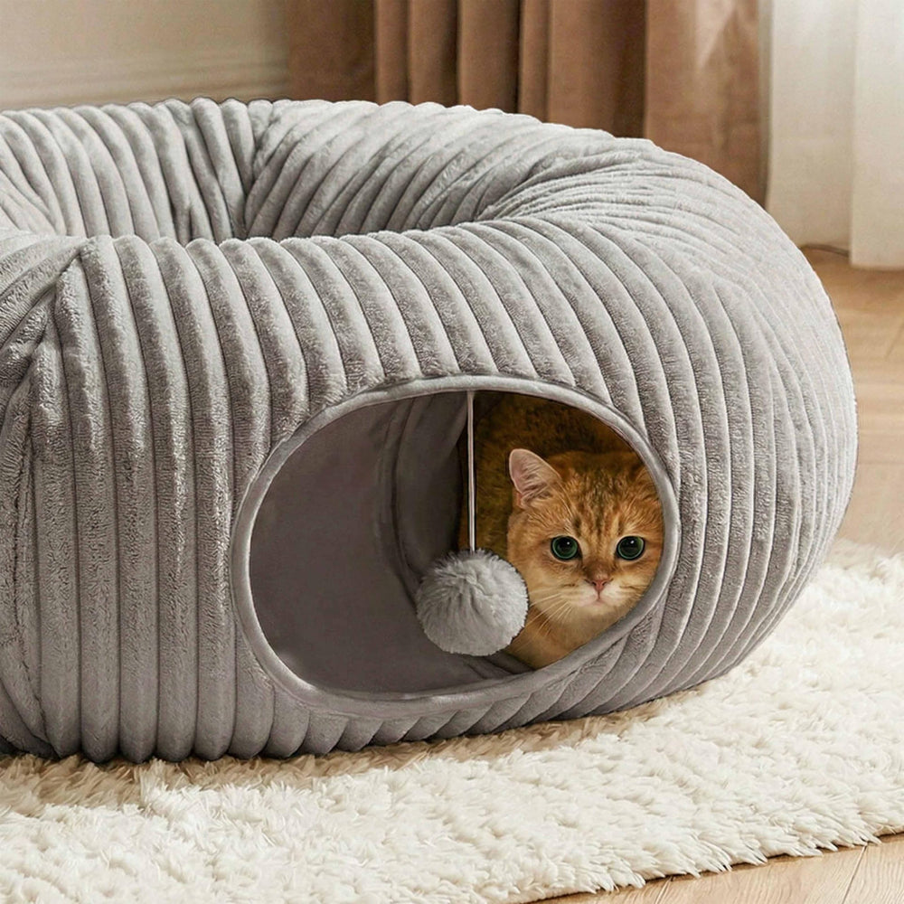 MOYMO donut tunnel with soft padding invites restful lounging and cuddly moments.