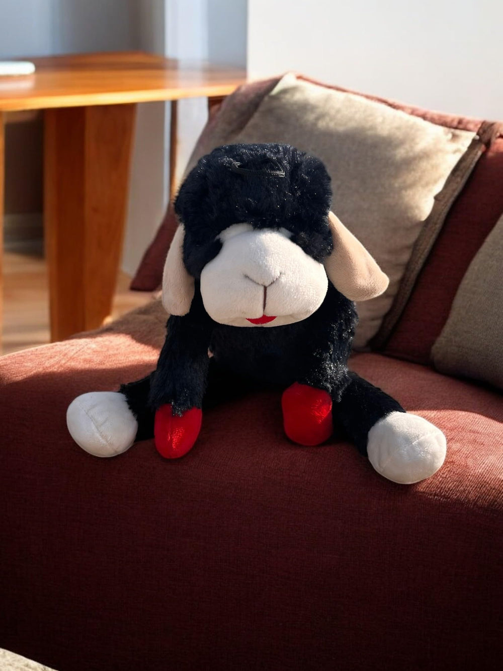 Multipet Lamb Chop plush toy with rugged stitching for long-lasting play sessions.