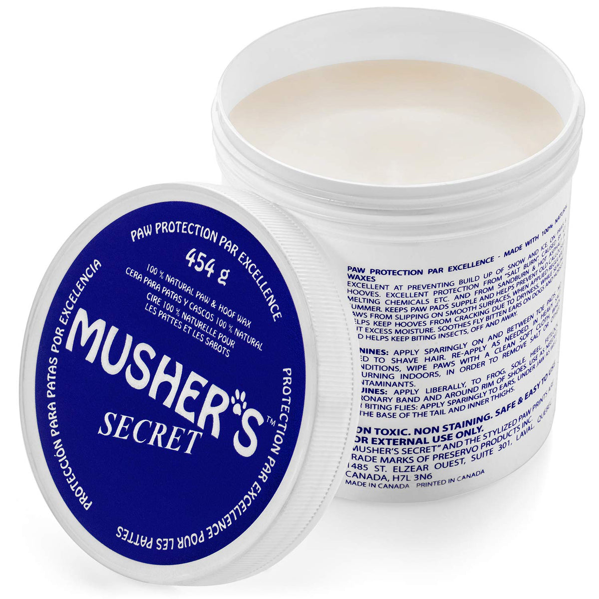 Musher's Secret paw wax tin close-up showing natural ingredients for paw protection.