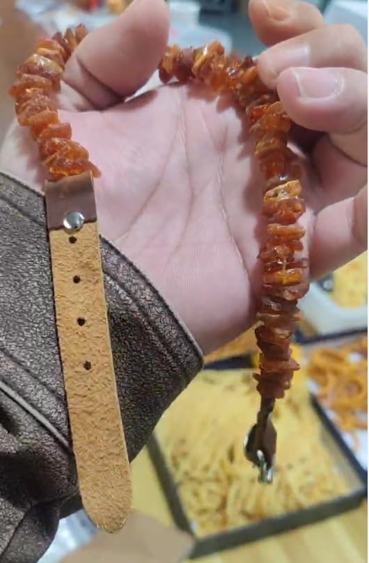 Soft leather base with amber beads on Mysora collar for comfort.