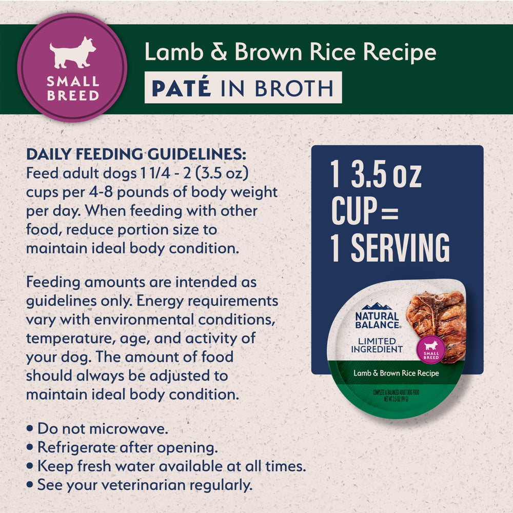 Natural Balance dog enjoying meal from a cup of lamb-brown-rice formula