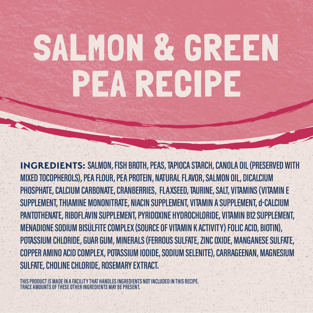 Close-up of salmon morsels in Natural Balance cat food can highlighting single-protein formula.