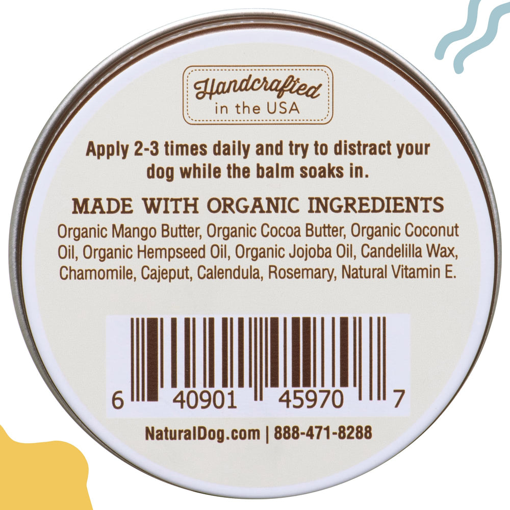 Natural Dog Company Paw Soother balm on dog paw close-up communicates soothing action.