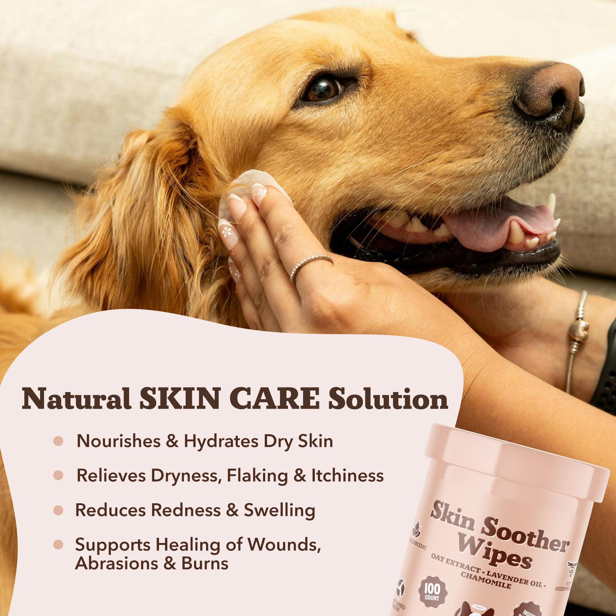 Natural Dog Company Skin Soother Wipes on a dog paw for gentle cleansing.