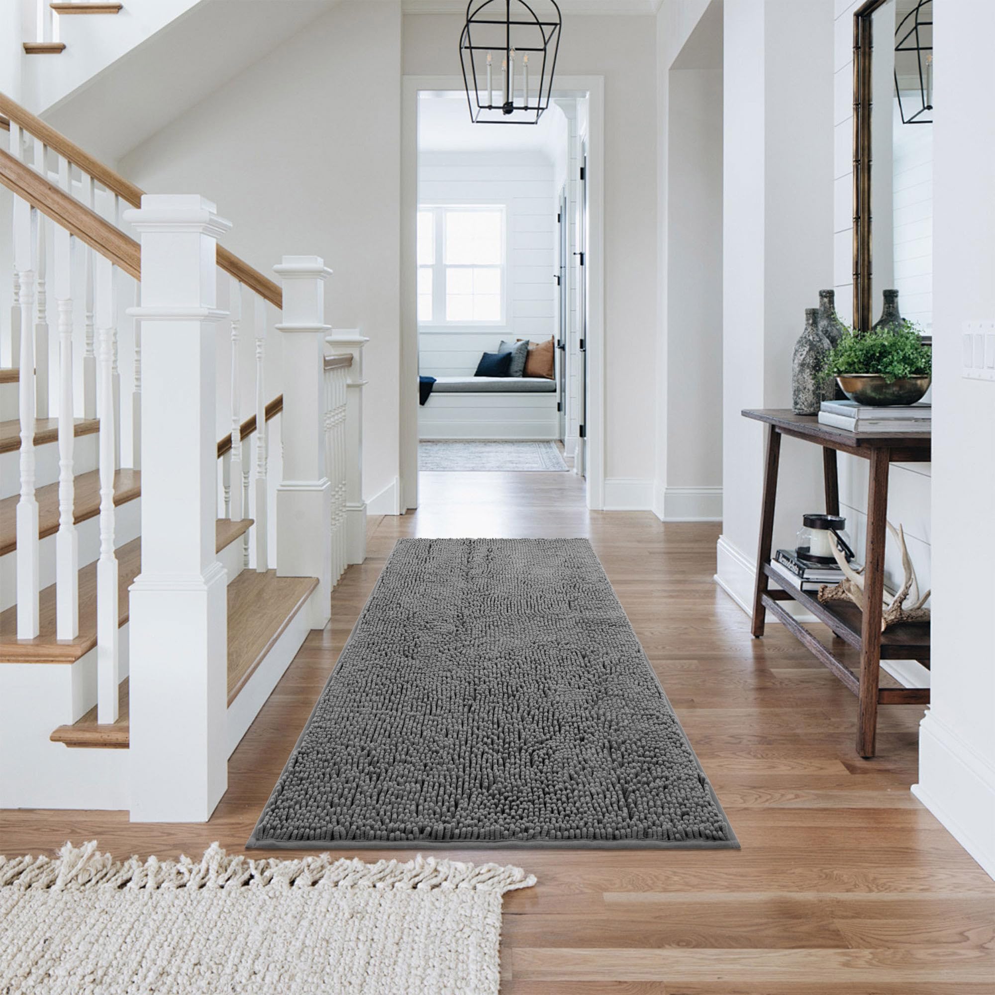 Naturei chenille light gray mat complements modern entryways.