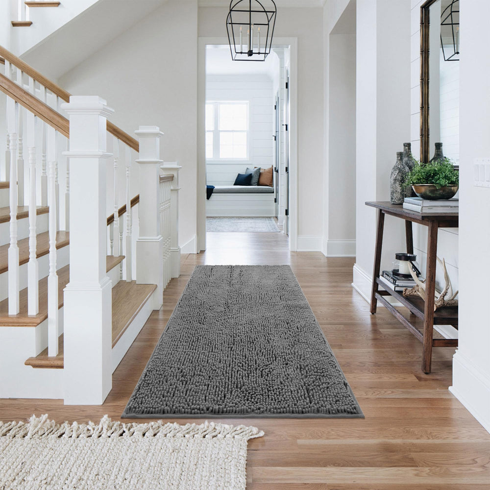 Naturei chenille light gray mat complements modern entryways.