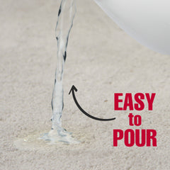 Nature's Miracle Urine Destroyer Plus application — spray-on application on carpet for quick action.