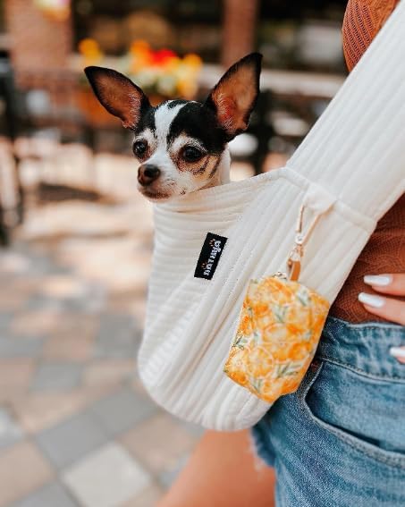 NATUYA small dog carrier sling adjustable strap in use.