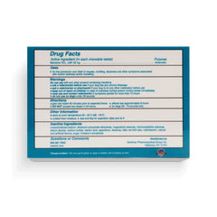 Close-up of NausX tablets highlighting small, odor-free pills for quick use