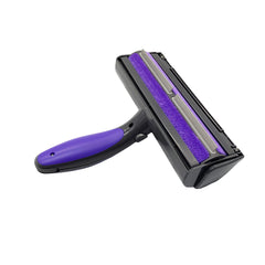NC Furdaddy Sonic Pet Hair Remover on a bed removing hair from sheets